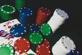 Up close photograph of playing cards and stacks of poker chips Royalty Free Stock Photo