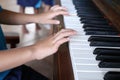 up close piano player with hands