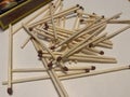 Picture of scattered match sticks and matchbox in background Royalty Free Stock Photo