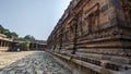 Up close to the temple walls filled with stone sculptures, Dharasuram, Tamil Nadu, India Royalty Free Stock Photo