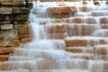 Up close view at decorative waterfall in a park of San Antonio, Texas.