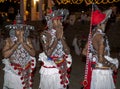 Up Country Dancers pray in front of the Temple of the Sacred Tooth Relic in Kandy, Sri Lanka. Royalty Free Stock Photo