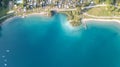 Up and down drone aerial view of the lake Ledro. A natural alpine lake. Amazing turquoise, green and blue natural colors Royalty Free Stock Photo