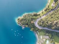 Up and down drone aerial view of the lake Ledro. A natural alpine lake. Amazing turquoise, green and blue natural colors Royalty Free Stock Photo