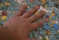 up of hand placing the puzzle , Hand holding missing jigsaw puzzle piece Royalty Free Stock Photo