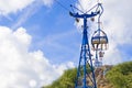 Up the mountain by chairlift hovering in summer Royalty Free Stock Photo