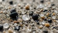 Up of a sandy surface with small pebbles and stones of varying Royalty Free Stock Photo