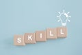 Up skilling and personal development concept. Skill training, education, learning, ability, knowledge, SKILL word on wooden Royalty Free Stock Photo