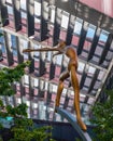 Up There-Sculpture on First Street, Manchester. One of five 2.5m sculptures set on 5m stainless steel columns by Collin Royalty Free Stock Photo