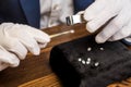 Up view of jewelry appraiser examining