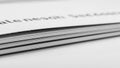 Up view of a stack of white paper sheets focusing on the edges and Royalty Free Stock Photo