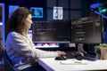 Upbeat IT expert pleased after increasing data security using computer