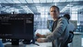 Upbeat technician safeguarding data center hardware, securing system