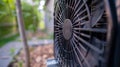 An upclose look at the fan blades responsible for pulling air through the heat pumps outdoor unit for cooling