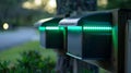 An upclose shot of a solarpowered mailboxs notification system displaying the bright green light that turns on when new Royalty Free Stock Photo