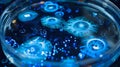 An upclose view of bioluminescent bacteria swirling in a petri dish forming a mesmerizing pattern of glowing orbs