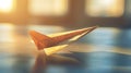 An upclose view of a paper airplane folded using origami techniques representing the simplicity and effectiveness of Royalty Free Stock Photo