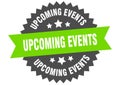 upcoming events sign. upcoming events round isolated ribbon label.