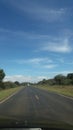 Upcountry outdoor horizon sky road vanishingpoint Royalty Free Stock Photo