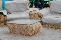 Upcycling ideas, Recycle crafts for home. coffee table and chair made of straw bales. Alternative eco-friendly furniture