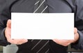 Update your company! Body part of a man holding a sign board