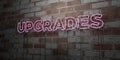 UPGRADES - Glowing Neon Sign on stonework wall - 3D rendered royalty free stock illustration