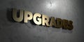 Upgrades - Gold sign mounted on glossy marble wall - 3D rendered royalty free stock illustration