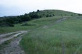 Uphill dirt path beautiful green calm