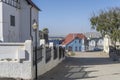 uphill street with picturesque old buildings at historical town, Luderitz, Namibia