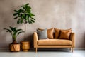 Upholstered sofa loveseat leather cushions and potted plants to the side set against a pale grey textured wall contempory interior