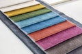 Upholstery fabric samples. colorful fabric sampler chart. colorful fabric texture background Royalty Free Stock Photo