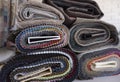 Upholstery samples rolled up with a blurred cloth office Royalty Free Stock Photo