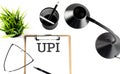 UPI - Unified Payment Interface text on a clipboard on the white background