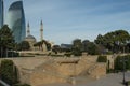 Upland park , Turkish mosque on the background of the tallest buildings