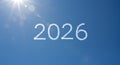 The year 2026 is formed by clouds in a sunny blue sky Royalty Free Stock Photo