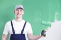 Upper body portrait of a young, smiling home renovation worker p