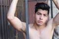 Upper body shot of male teen angry, and sweaty after hours of skateboarding Royalty Free Stock Photo