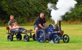 Miniature Steam Traction engine giving rides across field