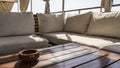 On the upper deck of the cruise ship, next to the railing, there are couches with soft pillows Royalty Free Stock Photo