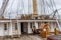 The upper deck on the frigate Jylland with the steering wheel and the mast