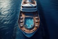 The upper deck of a luxury ocean cruise ship drifting in the sea. Swimming pool and jacuzzi, sun loungers, pool bar Royalty Free Stock Photo