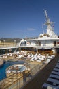 Upper deck swimming pool of Insignia Oceania Cruise ship as it cruises Mediterranean Ocean, Europe