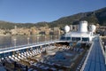 Upper deck swimming pool of Insignia Oceania Cruise ship as it cruises Mediterranean Ocean, Europe