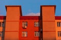 Upper floors of a high-rise building at sunset