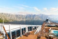 The upper level deck of a large cruise ship in the Bay of Kotor on the Adriatic in Kotor, Montenegro.