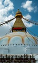 The upper part of the Boudhanath stupa in Kathmandu, Nepal. The image of Buddhas eyes on a gold surface of the stupa. Royalty Free Stock Photo