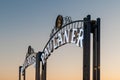 The upper part of the decorative gate with the emblem of the Paulaner beer company stands at the Beer Festival on the embankment o Royalty Free Stock Photo