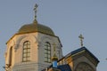 Upper part of the Orthodox Church in the sunset hatchings on the background of the sky