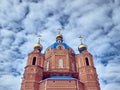 The upper part of the Orthodox church, three golden domes and three crosses Royalty Free Stock Photo