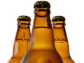 Upper part of three beer bottles Royalty Free Stock Photo